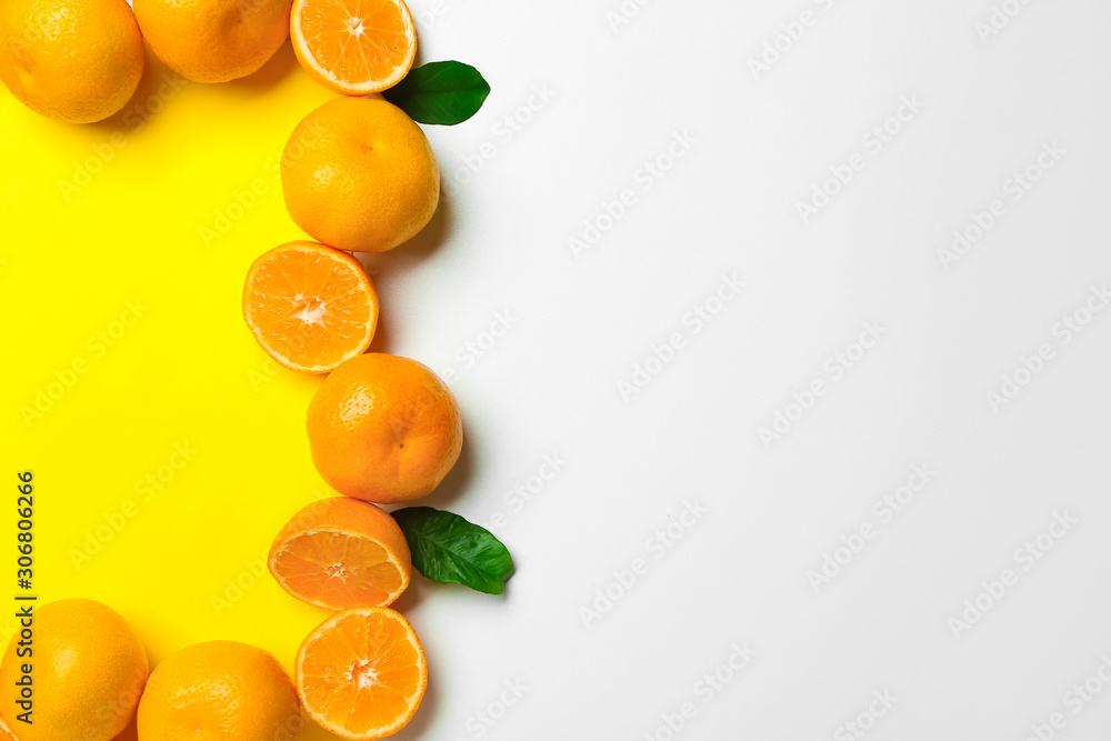 Frame made of ripe tasty tangerines on white background