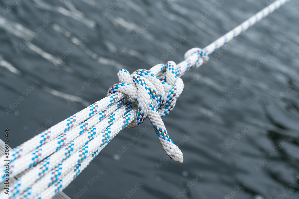 Close up of a knot in a rope of a sailing boat