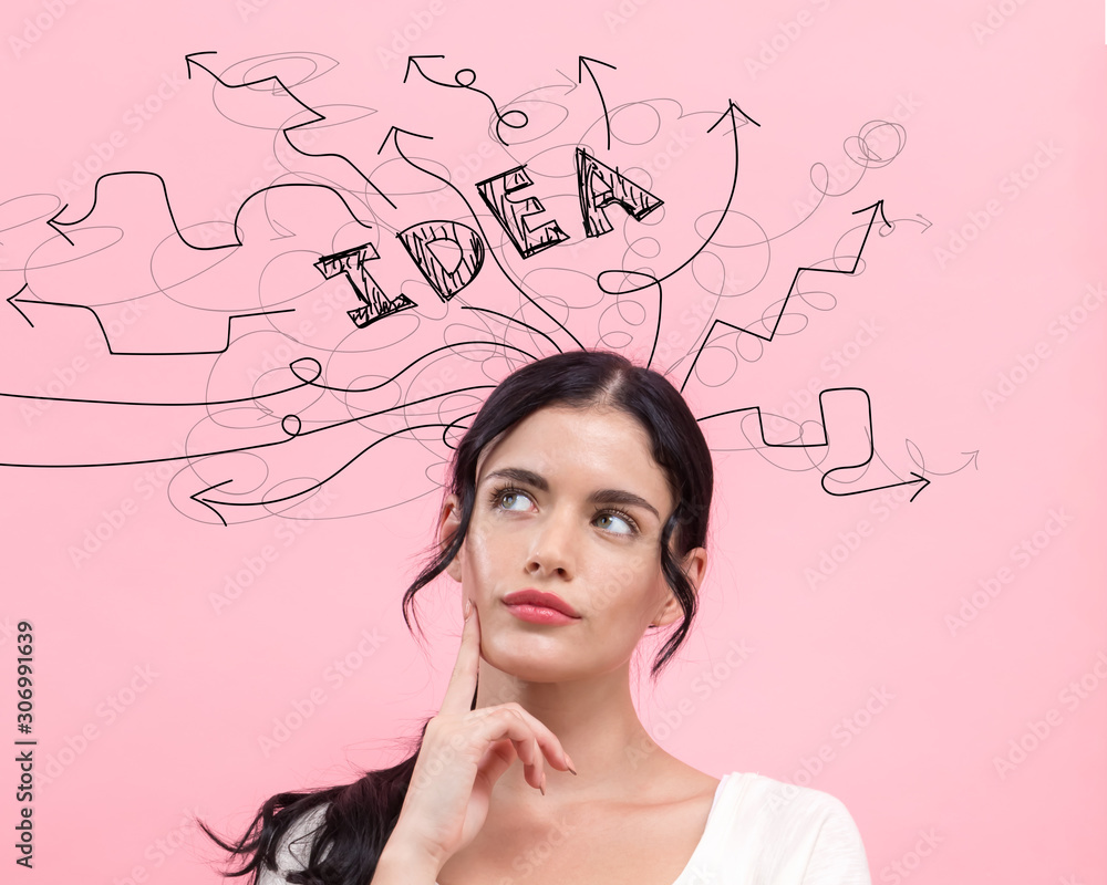 Brainstorming idea arrows with young woman in thoughtful pose