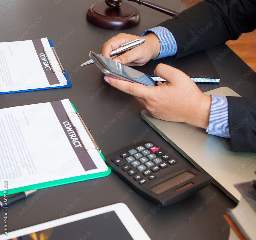 Lawyer is contacting his client by using a mobile phone. Businesspeople connect with customers who w