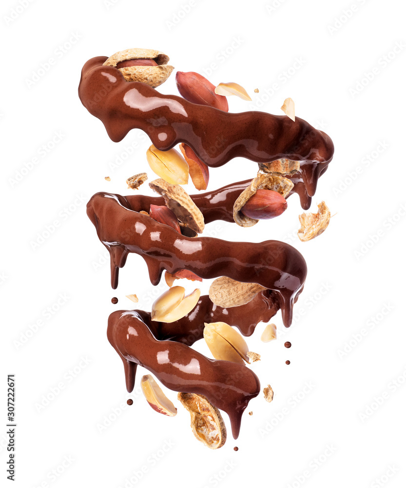 Chocolate splashes in spiral shape with crushed peanuts, isolated on a white background