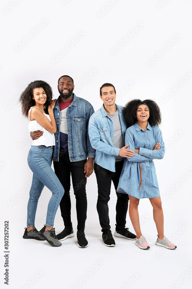 Portrait of young African-American people on white background