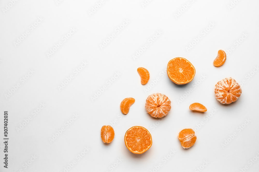 Sweet tangerines on white background