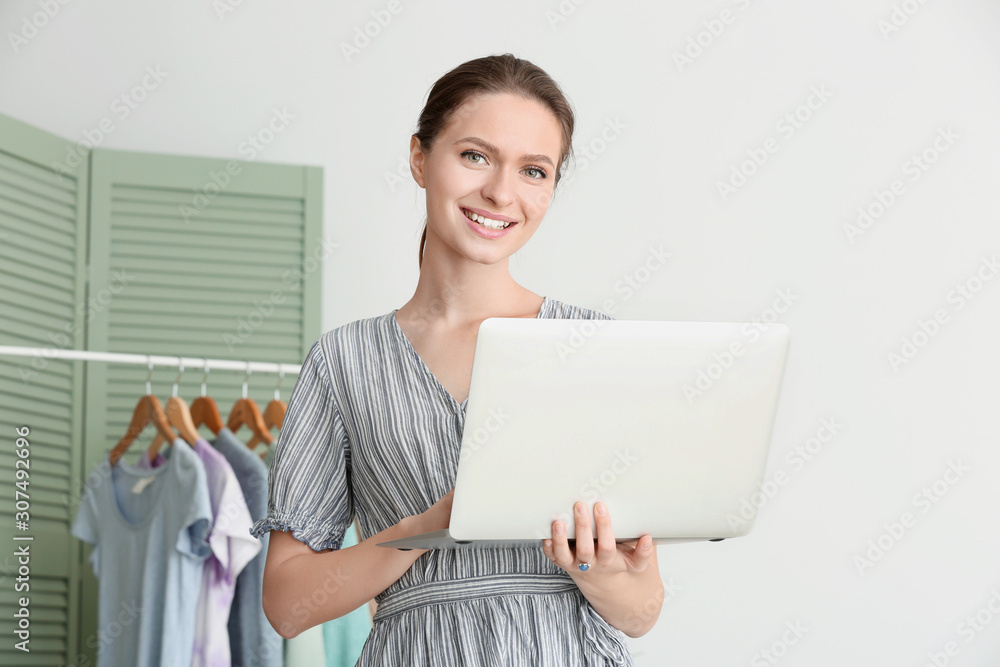 Female owner of online shopping site preparing order for client