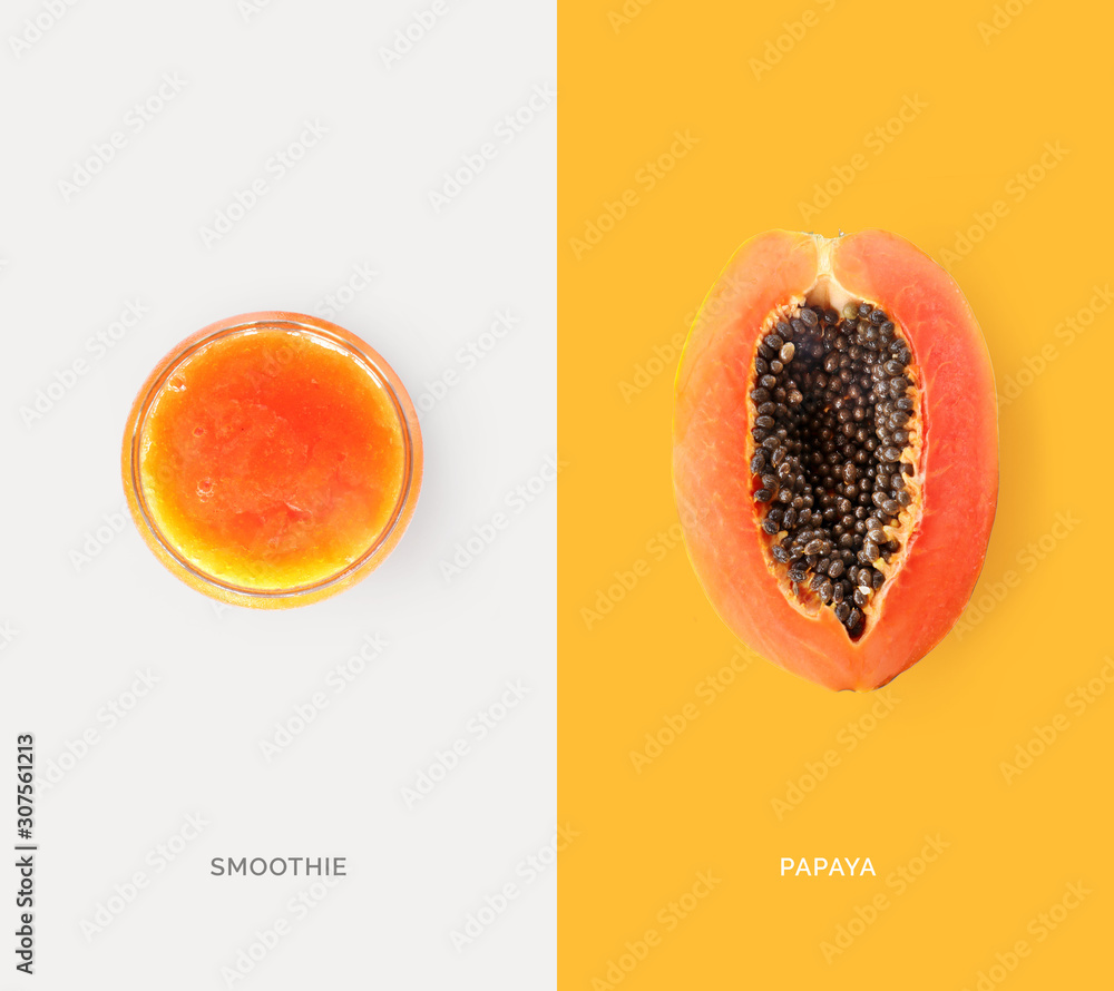 Creative layout made of papaya juice and papaya. Flat lay. Food concept. Macro concept.