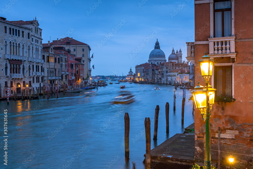 Venice city at dusk with Santa Maria della Salute Basilica, Italy