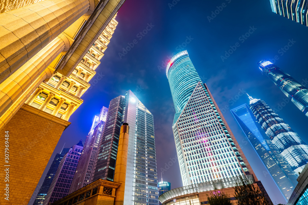 Shanghai Lujiazui city street night view and modern architecture office building