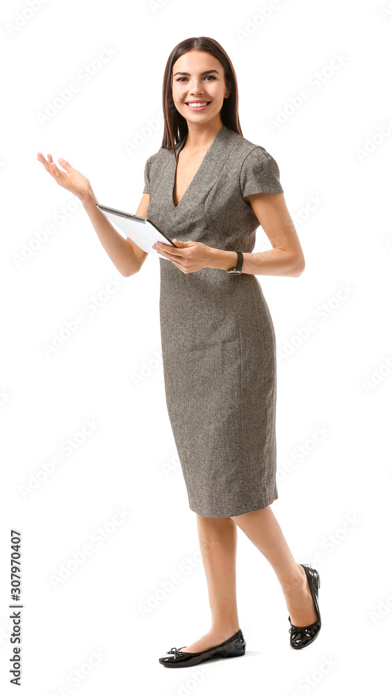 Beautiful young businesswoman with tablet computer on white background