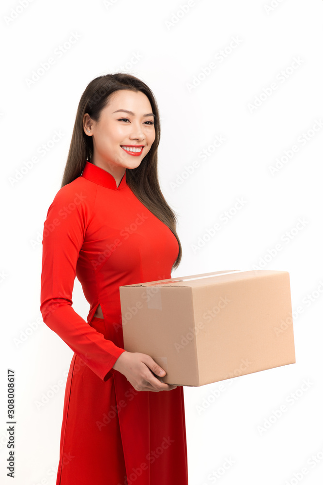 Asian girl with Vietnamese traditional dress holding gift box, Lunar New Year Greetings