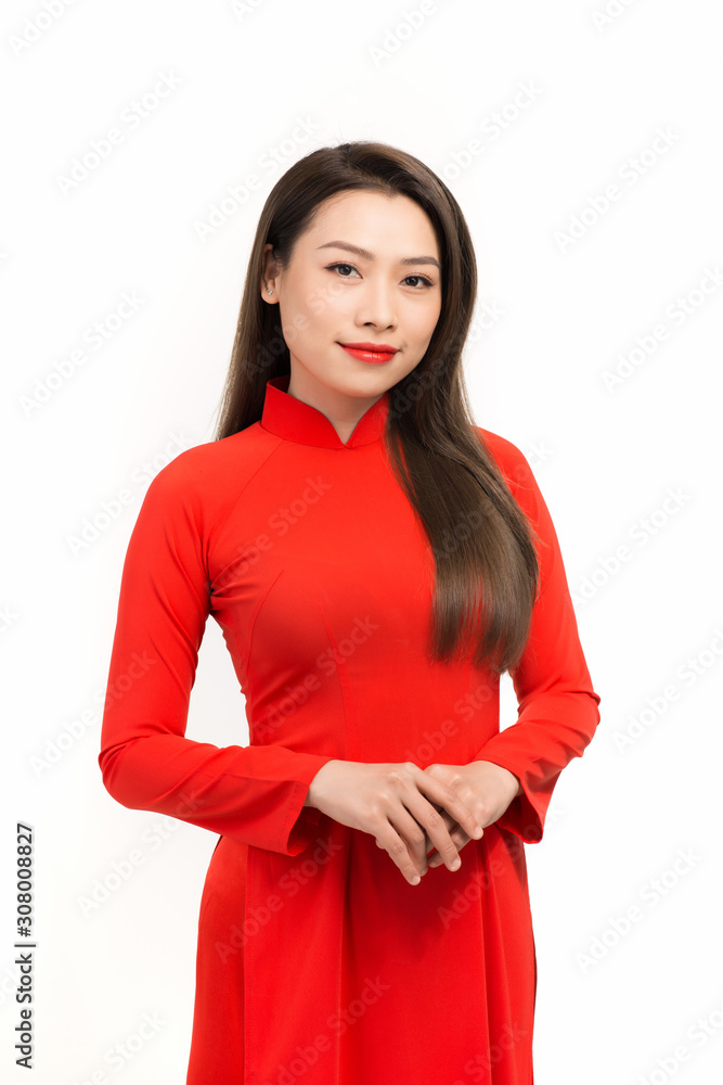 Happy chinese new year Beautiful Asian woman wearing red Vietnamese traditional dress in classic vin