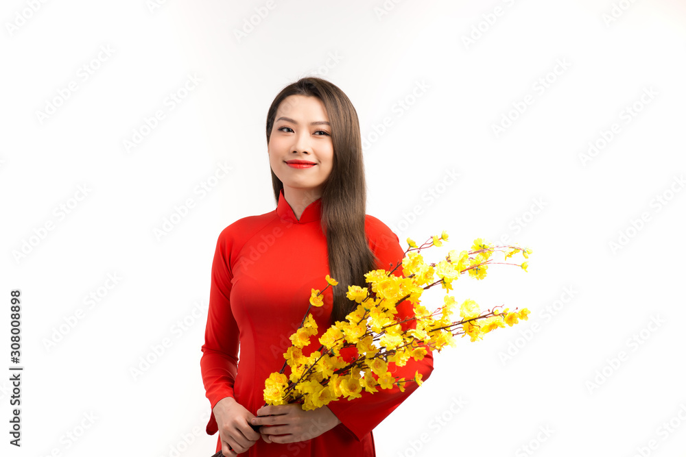 Vietnamese woman holding flower means happy new year