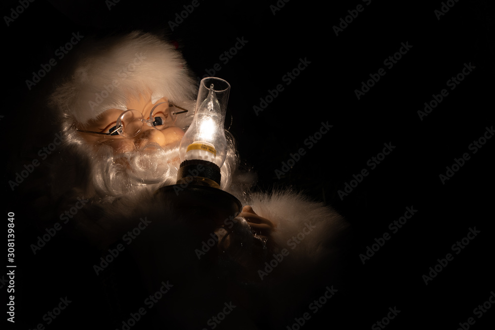 Santa Claus Holding Candle Light