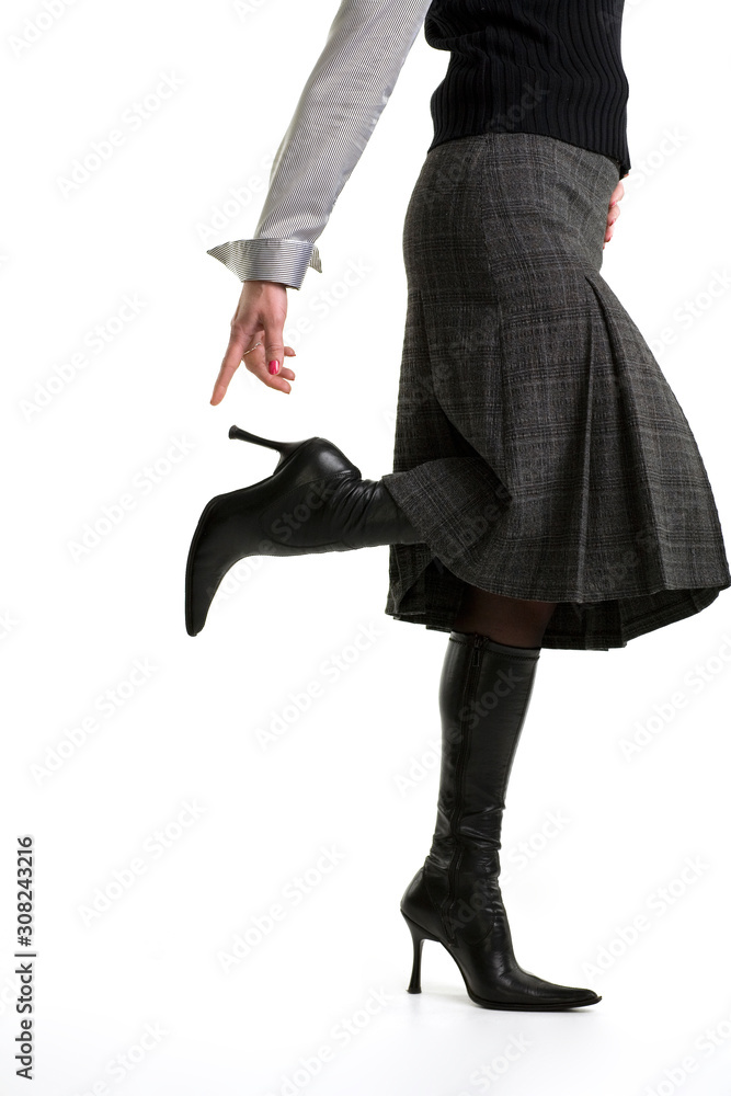 woman try to touch her heel on white background