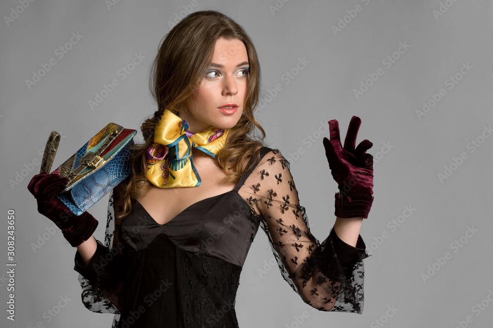 Woman is posing in the studio