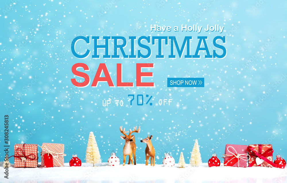 Christmas sale message with reindeer and Christmas gifts in snowy day