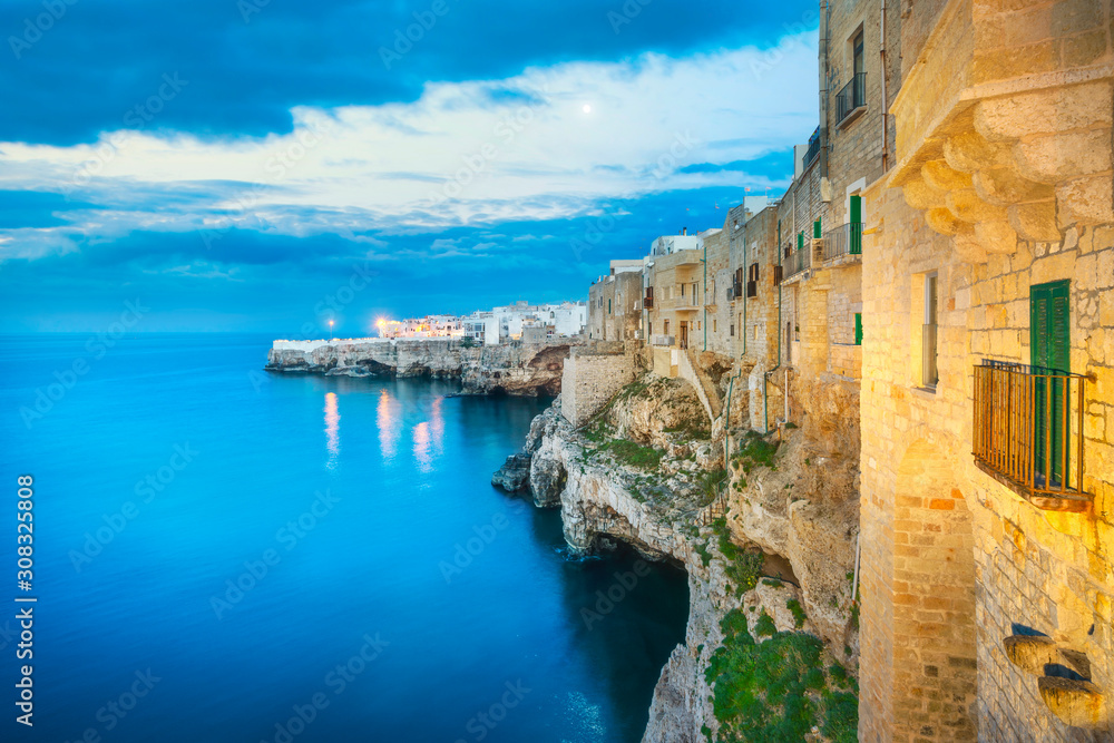 Polignano a Mare village at sunset, Bari, Apulia, Italy.