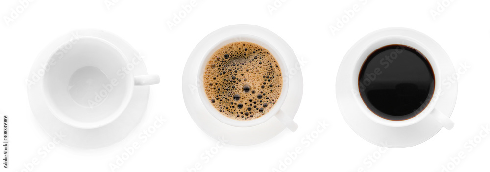 One empty cup and two cups of coffee on white background