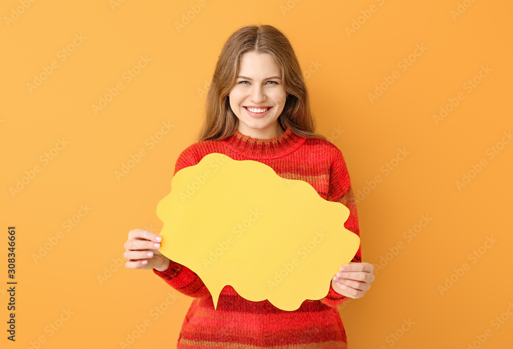 Young woman with blank speech bubble on color background