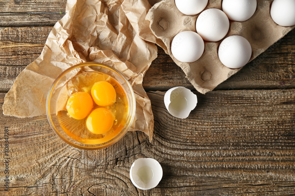 Fresh raw eggs on table