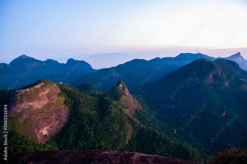 Sunrise at the top of Pedra da Gávea with panoramic views of the city of Rio de Janeiro. Brazil