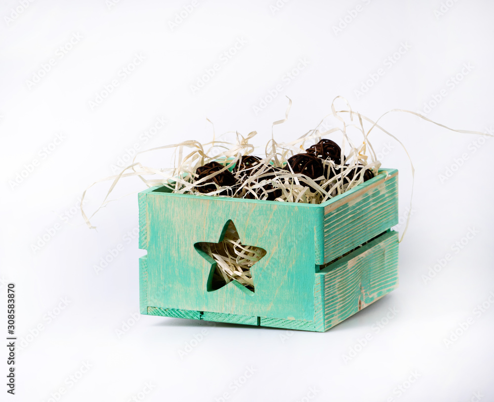 Home decoration in wooden crate on white background