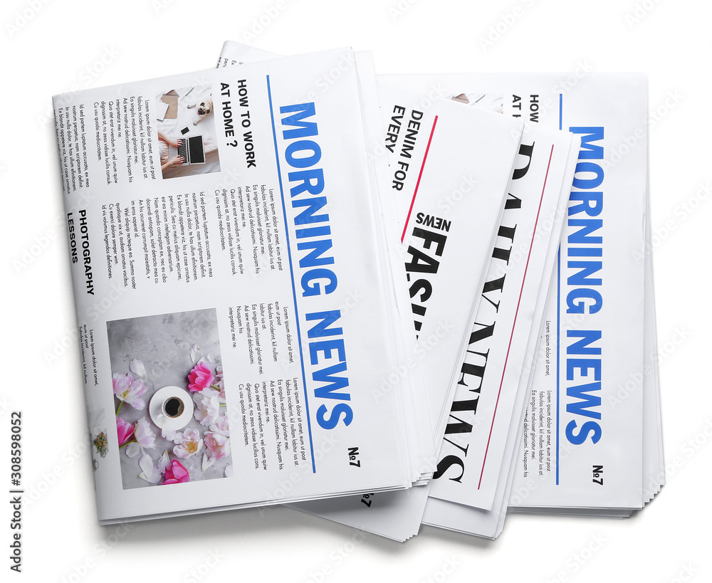 Morning newspapers on white background