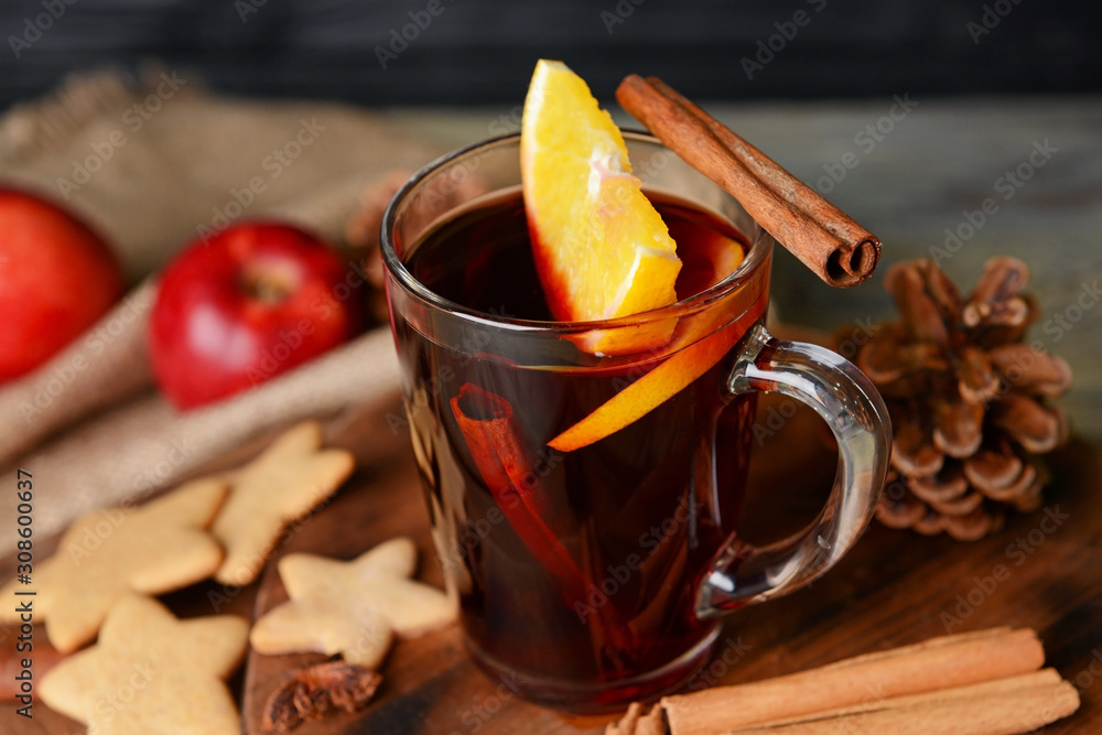 Cup of tasty mulled wine on table