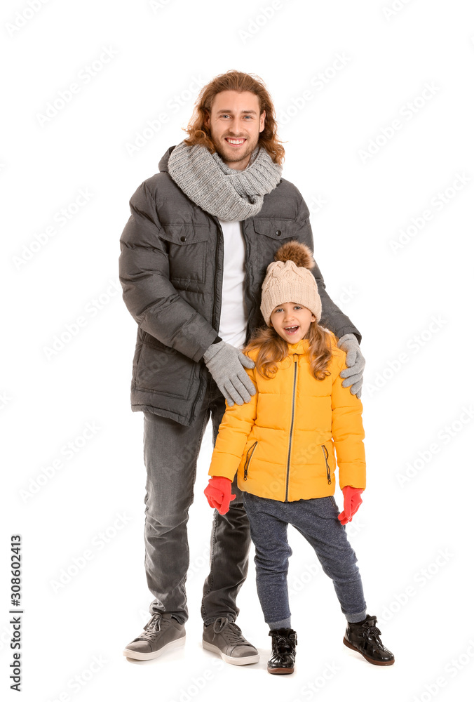 Man and his little daughter in winter clothes on white background