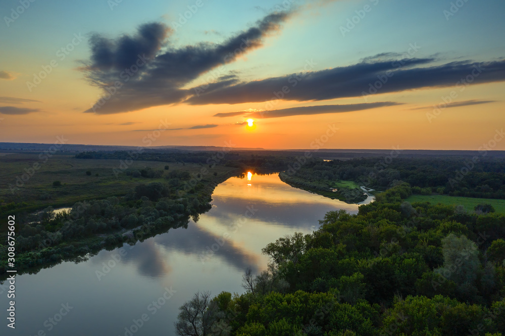 Aerial view landscape of sunrise or sunset with forest and river