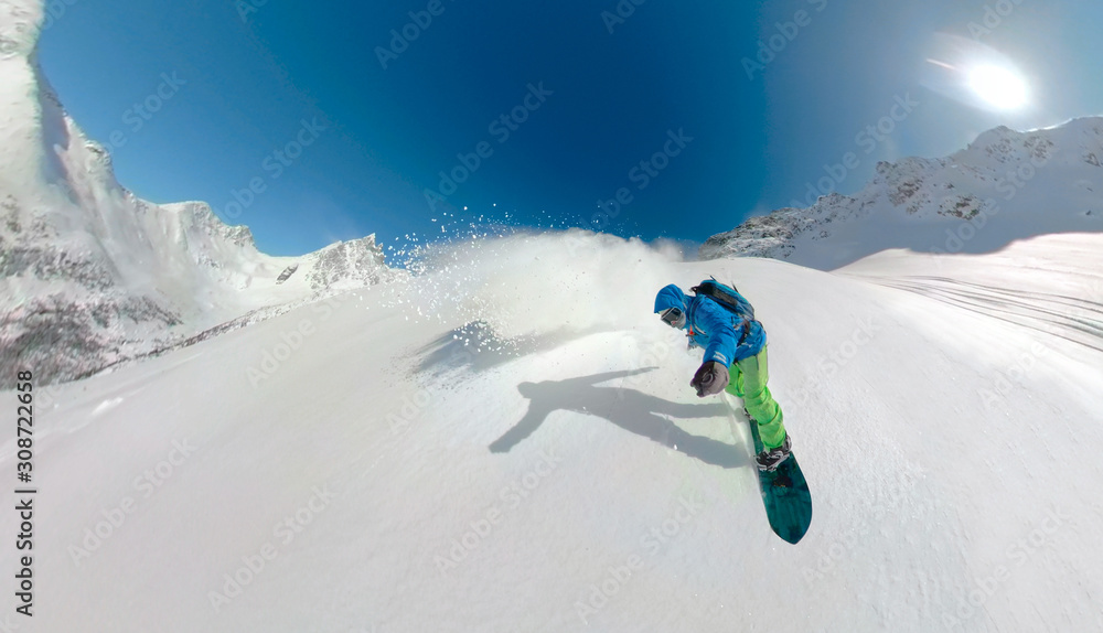 SELFIE Man shreds the powder snow during a heliboarding trip in British Columbia