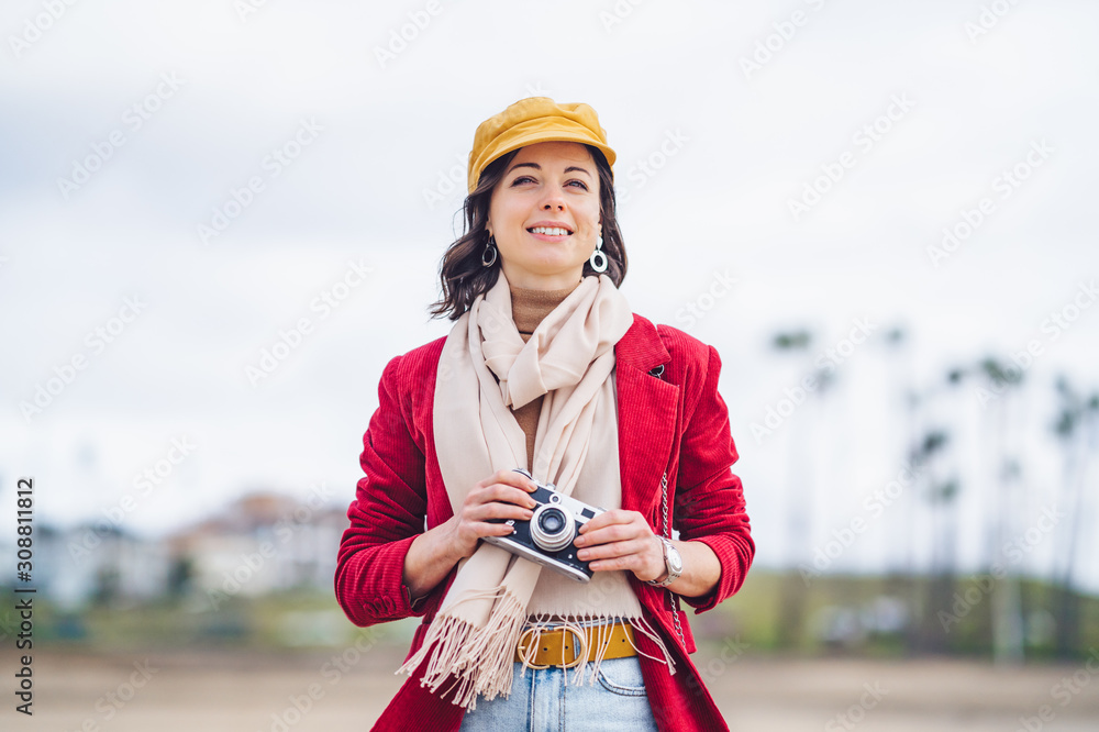 Young tourist with a retro camera in LA