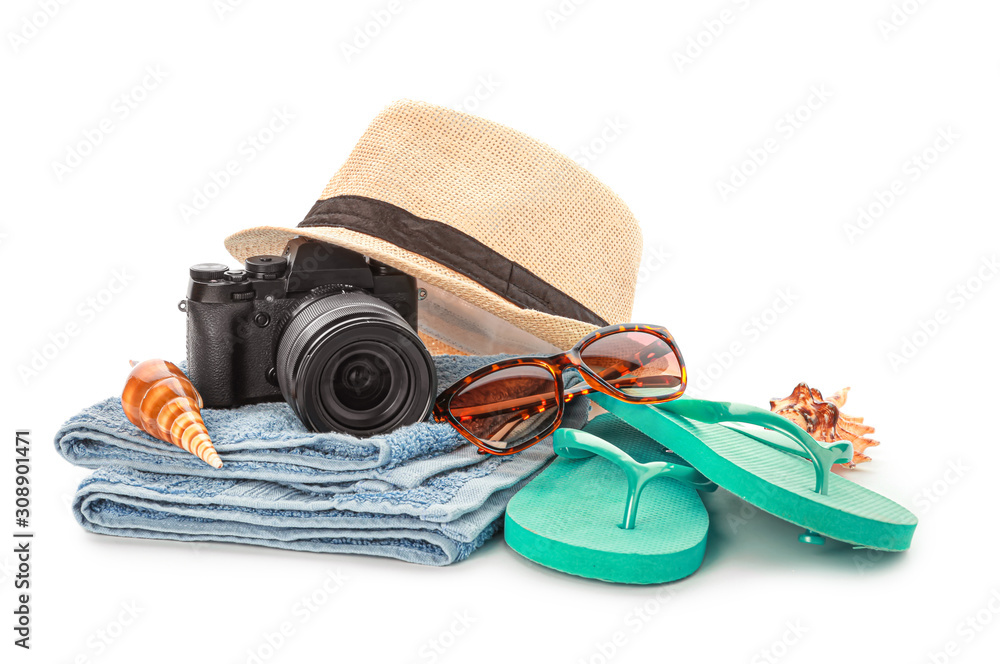 Set of beach accessories on white background