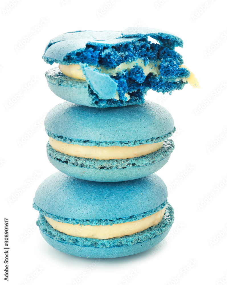 Tasty macarons on white background