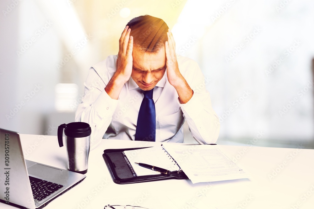 Businessman working with computer and  project in the office