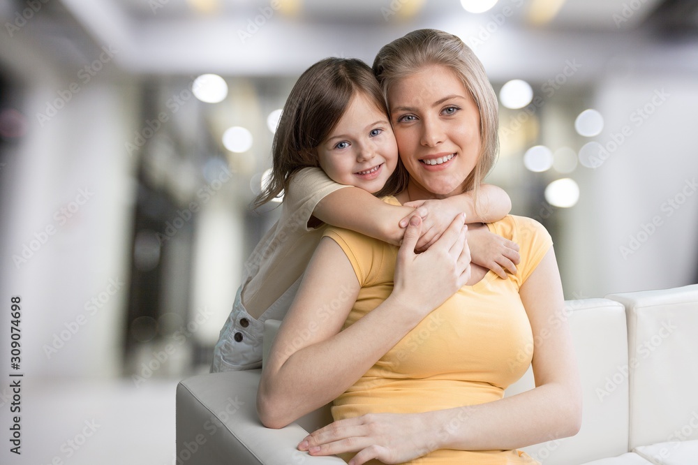 Happy Mother and daughter hugging