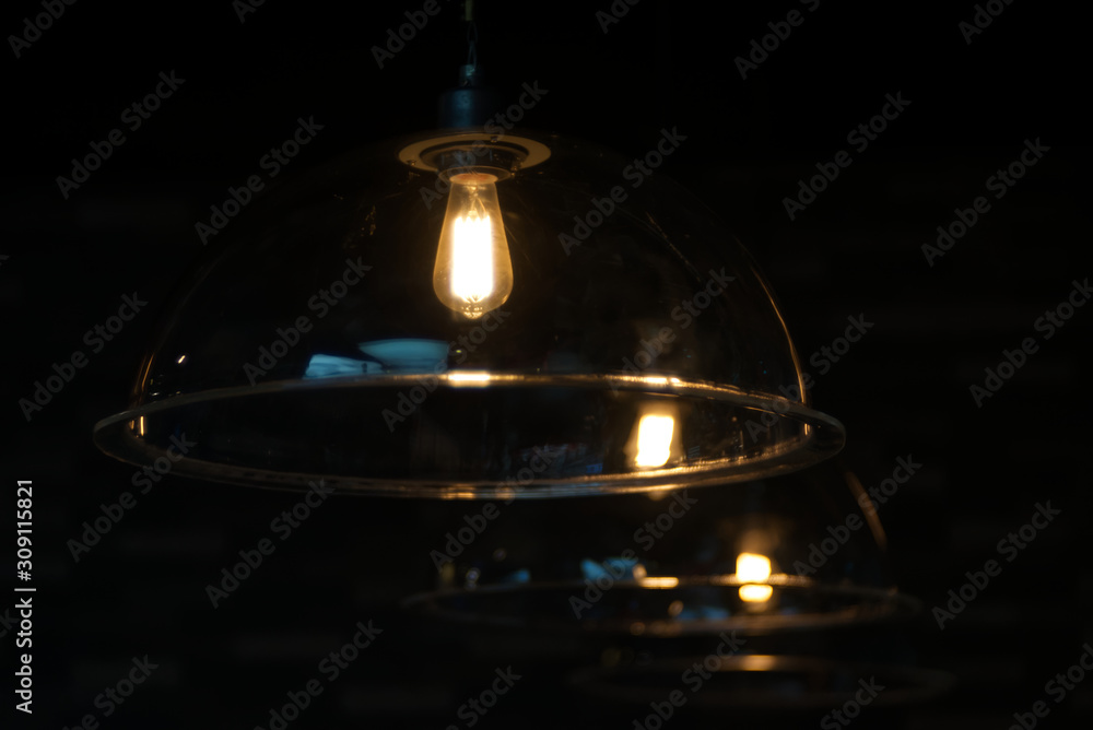 A hemisphere glass light probe with dark blur background