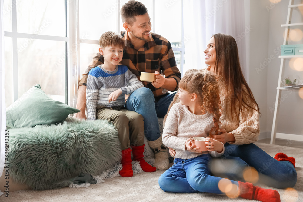 Happy family resting at home