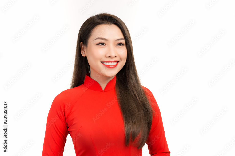 Happy chinese new year Beautiful Asian woman wearing red Vietnamese traditional dress in classic vin