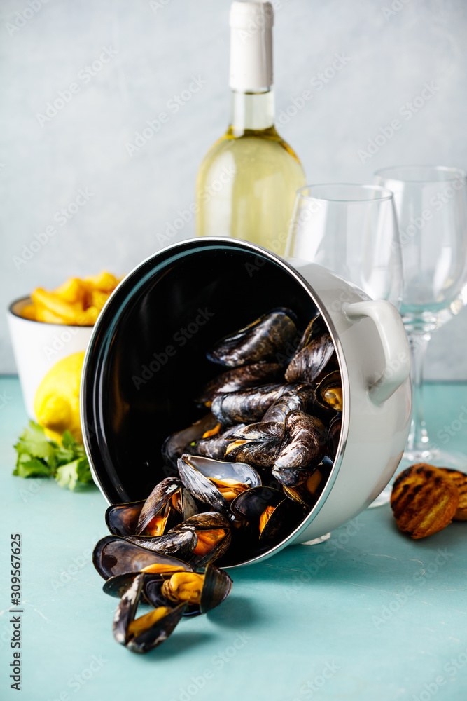 Belgian mussels in white wine with lemon, herbs, croutons and french fries