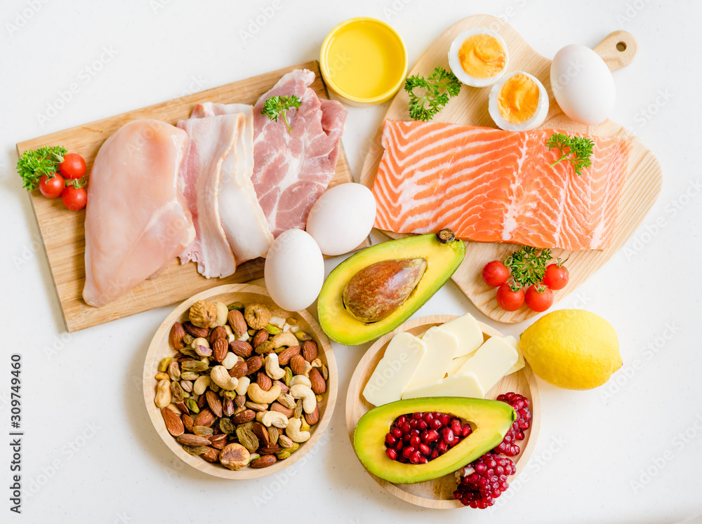 Keto picture.Flat lay of Keto diet food ingredients on white table.Ketogenic mean Low carb and High 