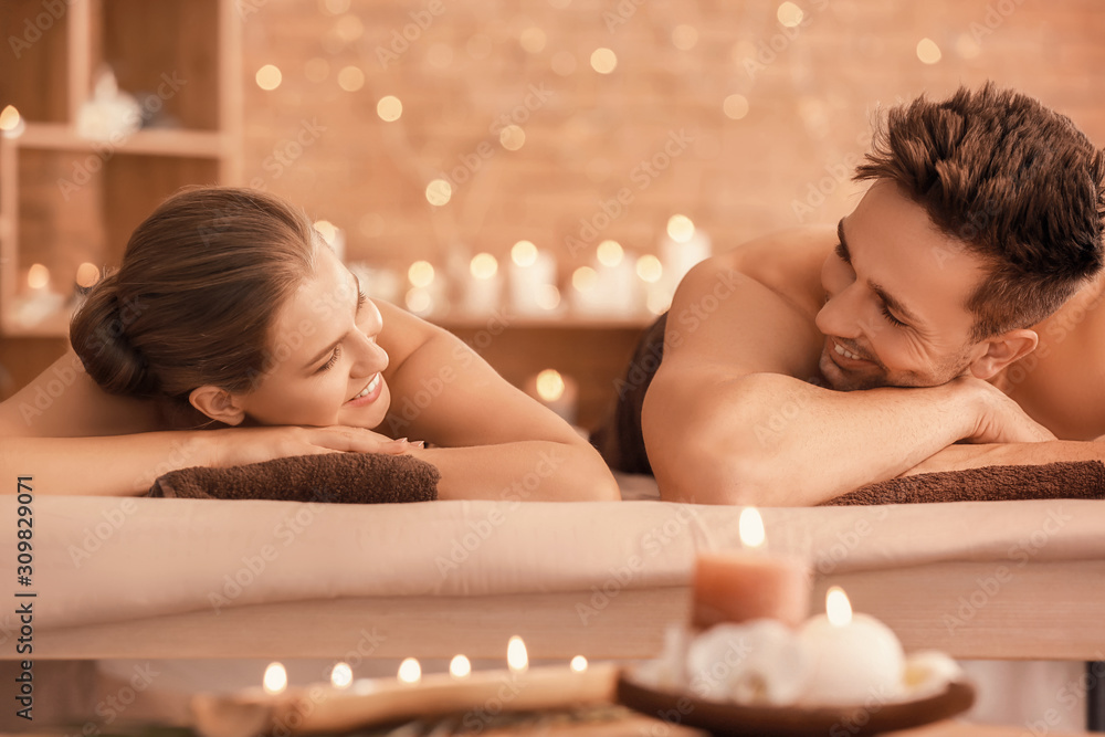 Young couple relaxing in spa salon