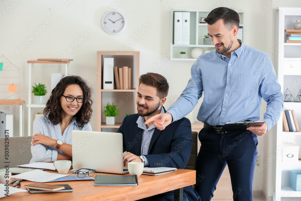 Team of business people during meeting in office