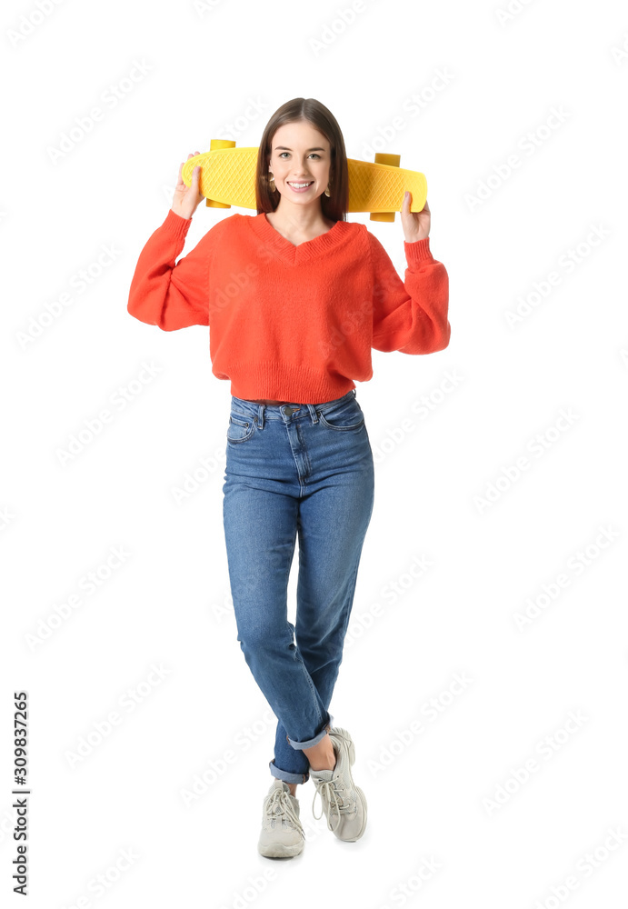 Stylish hipster girl with skateboard on white background