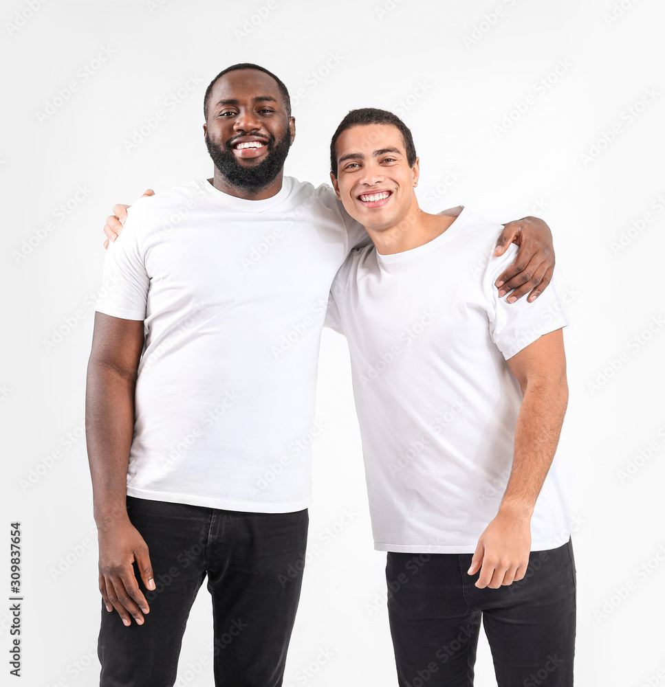 Portrait of young African-American men on white background