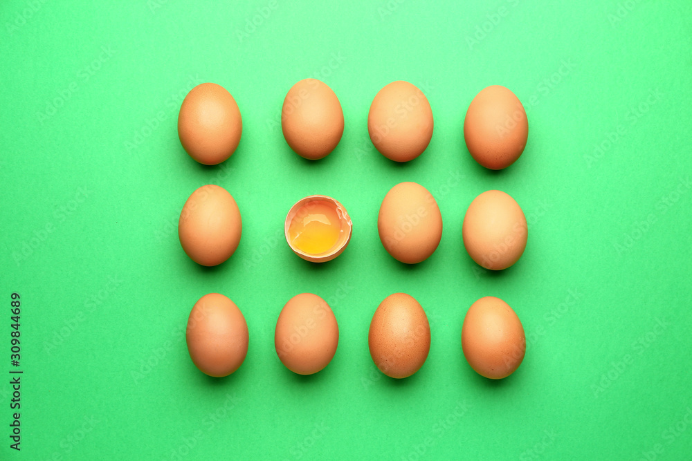 Fresh eggs on color background