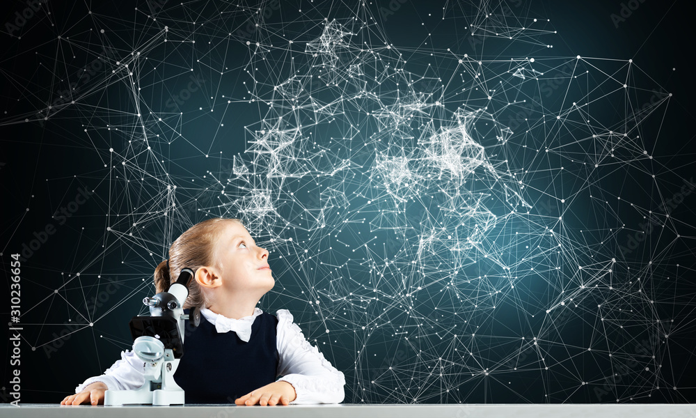 Little girl scientist with microscope