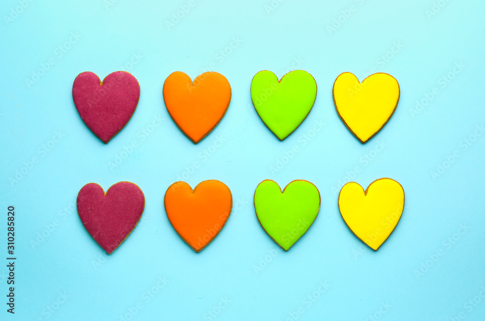 Heart shaped cookies for Valentines day on color background