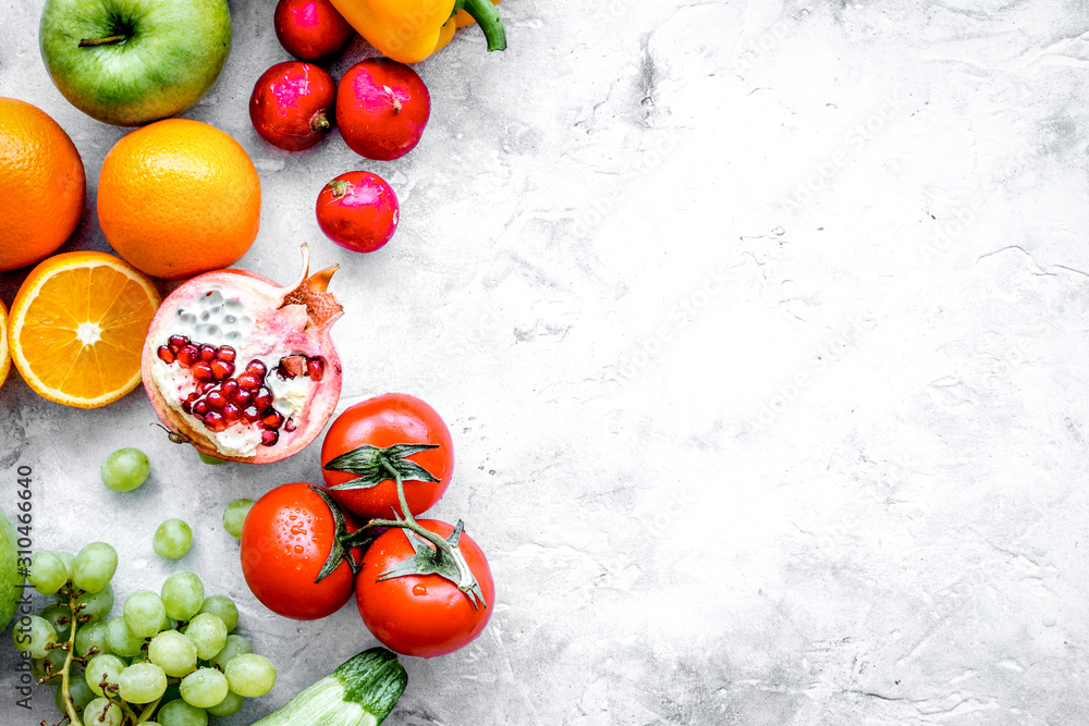 fresh vegetables and fruits for fitness dinner on stone background top view mockup