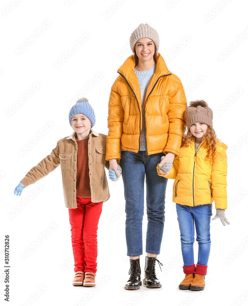 Happy family in winter clothes on white background