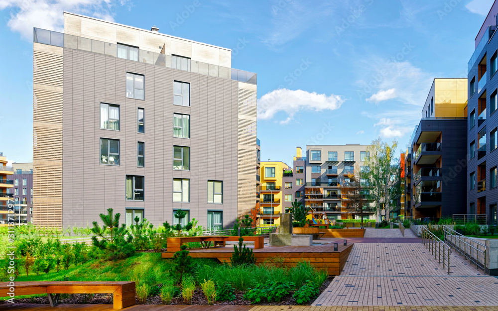 Benches at Modern european complex of residential buildings reflex